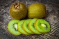 Close up fresh kiwi fruit on old wood background. Royalty Free Stock Photo