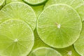 Close up of fresh lime slices as a background. green background with citrus fruit of lime slices. Royalty Free Stock Photo
