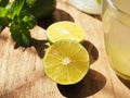 Close up fresh limes with mint leaves. Royalty Free Stock Photo