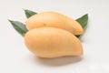 Close up of fresh Mangos with leaves on white background Royalty Free Stock Photo