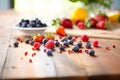 close-up of fresh mixed berries on a wooden table Royalty Free Stock Photo