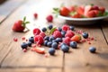 close-up of fresh mixed berries on a wooden table Royalty Free Stock Photo