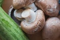 Close up of fresh mushrooms and zucchini.