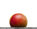 Close up of an organic apple fruit with outdour Background Royalty Free Stock Photo