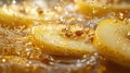 Close-up of a fresh pear slice topped with walnuts and honey drizzle, with glistening water droplets