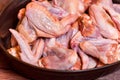 Fresh raw chickens wings in frying pan Royalty Free Stock Photo