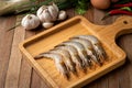 Close up Fresh raw shrimp Litopenaeus vannamei on wooden plate