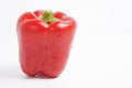 Close-up of fresh red bell pepper over white background Royalty Free Stock Photo