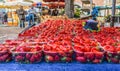 Close up fresh red strawberry berries in plastic containers in wooden box on retail display of farmers market, high Royalty Free Stock Photo