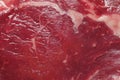 Close up of fresh rib eye steak. Selective focus. Meat and food industry. Juicy premium cut of beef. Quality product on black