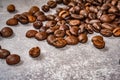 Brown roasted coffee beans closeup grey beton background Royalty Free Stock Photo
