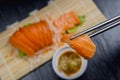 Close up fresh salmon sashimi set salad on bamboo plate, Japanese food Royalty Free Stock Photo