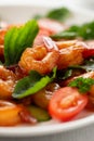 Close-up of fresh shrimp, tomato, arugula and greens salad, vertical image Royalty Free Stock Photo