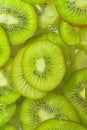 Close-up fresh slices of juicy kiwi fruit on white background. Slices of kiwi fruit in sparkling water on white Royalty Free Stock Photo