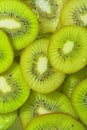 Close-up fresh slices of juicy kiwi fruit on white background. Slices of kiwi fruit in sparkling water on white Royalty Free Stock Photo