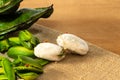 Close-up of a fresh tropical ice cream beans fruit with green sheath, big eatable seeds Royalty Free Stock Photo