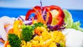 Close up of fresh vegetable and fruit salad Royalty Free Stock Photo