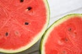Close up fresh watermelon pieces tropical summer fruit - Sliced half watermelon on wooden background Royalty Free Stock Photo