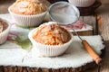 Close up of freshly baked almond and apricot muffins sprinkled w