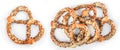 Close-up of freshly baked german pretzels with sunflower seeds on white background Royalty Free Stock Photo