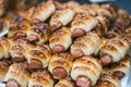 close-up of Freshly baked tasty sausage rolls, pigs in a blanket. Royalty Free Stock Photo