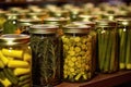 close-up of freshly canned pickles in glass jars Royalty Free Stock Photo