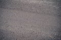 Close up of freshly paved asphalt road surface Royalty Free Stock Photo