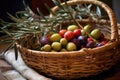 close-up of freshly picked olives in a rustic basket