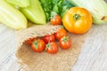 Close up of freshly pickled harvest of vegetbles - bell pepper, drill and tomatoes on wooden table. Rustic style. Organic healthy Royalty Free Stock Photo