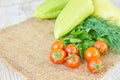 Close up of freshly pickled harvest of vegetbles - bell pepper, drill and tomatoes on wooden table. Rustic style. Organic healthy Royalty Free Stock Photo