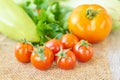 Close up of freshly pickled harvest of vegetbles - bell pepper, drill and tomatoes on wooden table. Rustic style. Organic healthy Royalty Free Stock Photo