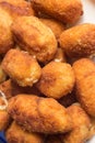 Close-up of fried croquettes texture.