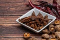 Fried Mushrooms Stipe Seasoned with Brown Sugar and Soya Sauce with Dried chili and Shiitake Mushroom