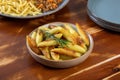 fried potatoes in ceramic bowl Royalty Free Stock Photo