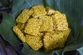 close up of fried tempe with banana leaf