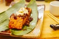 A close-up of fried tofu in a Chinese dish