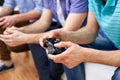 Close up of friends playing video games at home Royalty Free Stock Photo