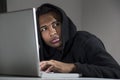 Close up of frightened African American hacker Royalty Free Stock Photo