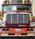 Close up of front of colourful vintage Guatemalan bus