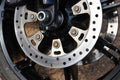 A close up of a front disc brake of a motorcycle Royalty Free Stock Photo