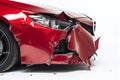 close up front half damaged red car, white background Royalty Free Stock Photo