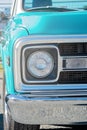 Close Up Of Front Headlight Of Blue Classic Car Royalty Free Stock Photo