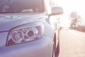 Close up front new silver SUV car. Detail of a modern car. Head light Royalty Free Stock Photo