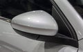The close up of front side of gray luxurious car side view mirror. Royalty Free Stock Photo