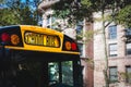 Close up of the front sign and lights of a typical American yellow school bus Royalty Free Stock Photo