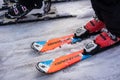 Close up of front of skis of a young skier