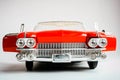 Close up front view of american classic red car. Realistic scale car model on the white background. Royalty Free Stock Photo