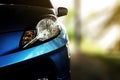 Close up of front view of blue car was In the garage Royalty Free Stock Photo