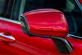 Close up front view of car side mirror. Front rear view mirror on the car window. Royalty Free Stock Photo