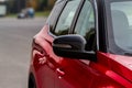 Close up front view of car side mirror. Front rear view mirror on the car window. Royalty Free Stock Photo